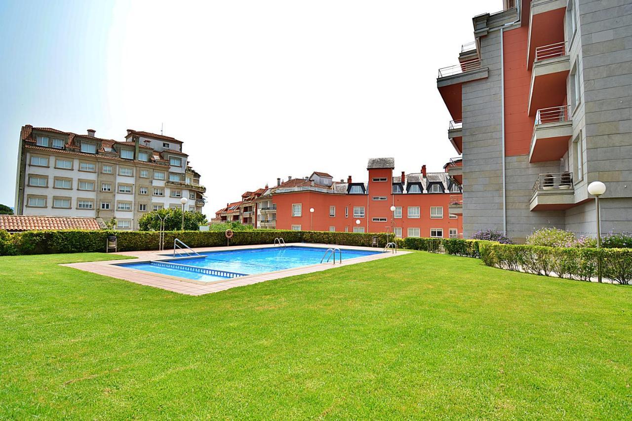 Galihost - Apartamento Con Piscina En El Centro De Sanxenxo Ngoại thất bức ảnh